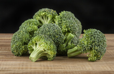 Broccoli on a wooden table