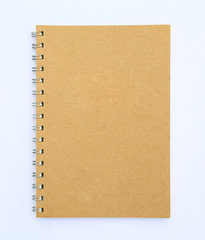 Notebook made from recycle paper on white background.