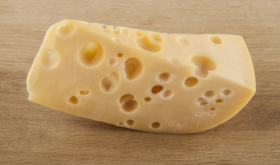 Cheese on a wooden background