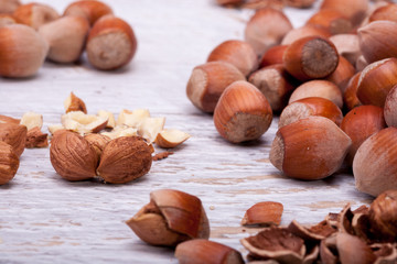 Healthy Hazelnuts on white wooden background in studio photo. Healhty snacks