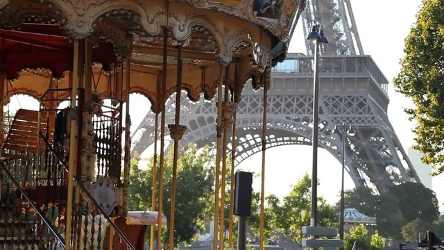 typical view of Paris, carousel and Eiffel tower, France