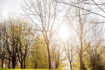 small girl walks in the park