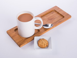 coffee or coffee with cookies on background.