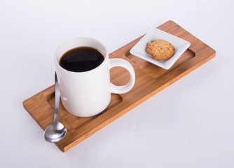 coffee or coffee with cookies on background.