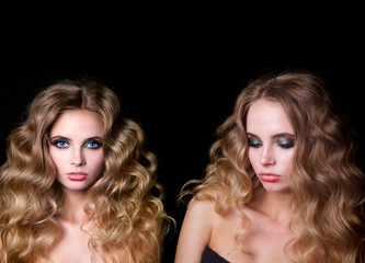 Naklejka premium Beauty Fashion Model Woman , portrait, hairstyle with creative hair-dress, curls waves. Concept Girl face with perfect skin in dark Background