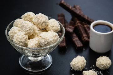 black coffee sweets on a black background