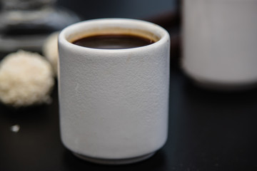 black coffee sweets on a black background