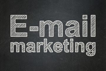 Fototapeta premium Advertising concept: E-mail Marketing on chalkboard background