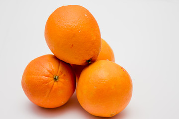 Valencia oranges on white background