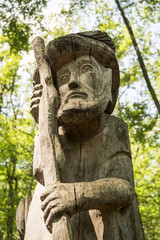 Fototapeta na wymiar Wood sculpture in the woods
