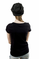 Girl in black T-shirt, back to photographer.Isolated on white background