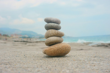 pyramid of stones on the beach