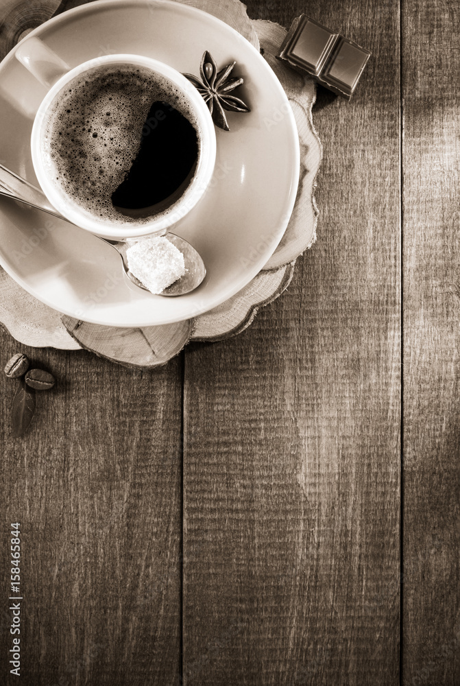 Wall mural cup of  coffee on wood