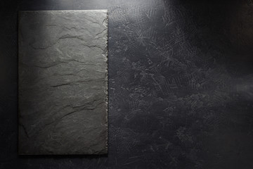 slate signboard at black background