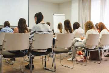 Women student during study, in lecture Audience