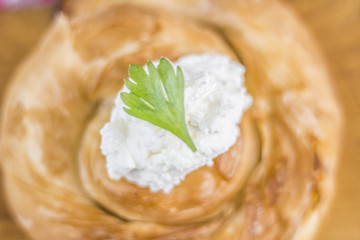 Cheese burek composition on white background