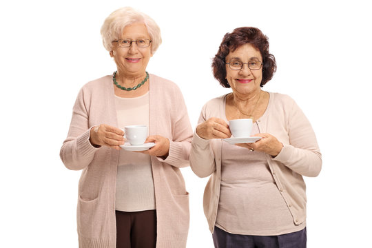 Two mature women with cups