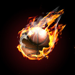Soccer ball on fire flying on black background
