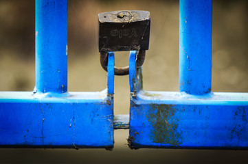 Padlock and Blue Gates