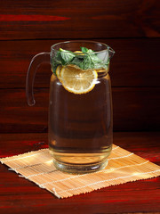 Still life of crockery and citrus on a wooden background