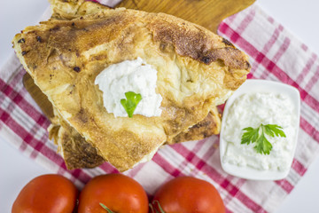 Cheese burek composition on white background