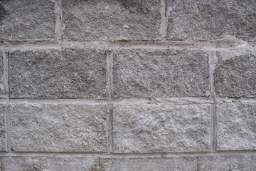 Grey brick wall texture background.