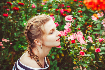 Fototapeta premium Woman in the summer garden