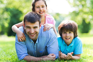 Fototapeta premium Father with two children 