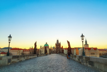 Fototapeta na wymiar Charles bridge, sunrise scenery. Prague iconic travel destination, Czech Republic. 