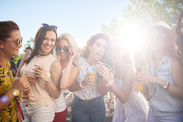 Female friends dancing at festival party outdoor