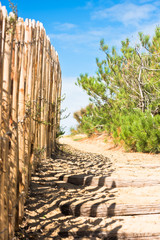 Wooden fence on Atlantic beach in France