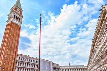 Fototapeta na wymiar St Marks Campanile The Tower of Venetia . San Marco square in Venice, Italy