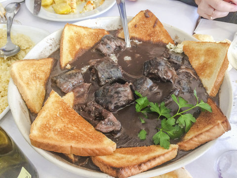 Lamprey on bordeaux sauce