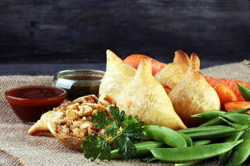 Indian special traditional street food punjabi samosa or Coxinha, Croquete and other Fried...