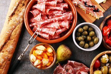 spanish tapas and sangria on wooden table - mediterran antipasti