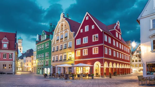 Colorful buildings on Market square (Marktplatz) at dusk in Memmingen,  Germany (static image with animated sky)

