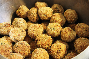 Falafel - a dish of deep-fried balls from chopped chickpeas, with the addition of beans, seasoned with spices