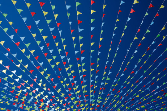 Small triangular waving flags.
