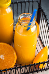Fresh Orange Juice, Glass Bottle of Juice,Wooden Tray, Straws