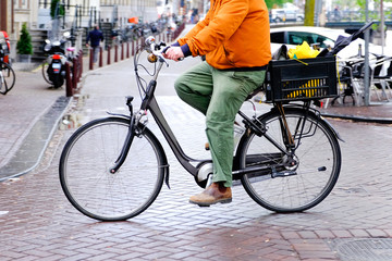 lower half of cyclist in amsterdam cycling