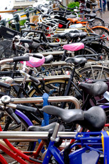 tangle of bikes in bicycle rack in Amsterdam