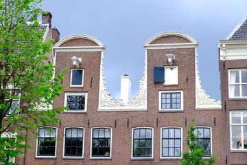 a detail of the gable ends of dutch canal side houses in Amsterdam