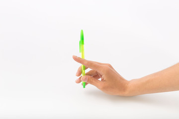 Female hands on a white background with a pen