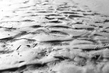 Stains on sand from water