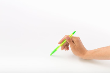 Naklejka premium Female hands on a white background with a pen