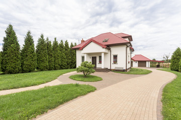 Fototapeta premium Big house with beautiful garden