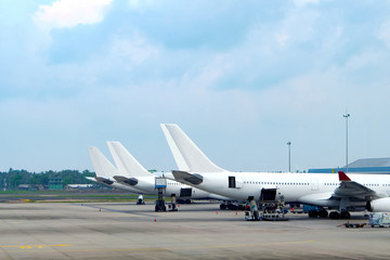 Fototapeta na wymiar Aircraft parked at the airport