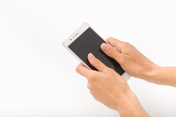 Female hands on a white background with a phone.
