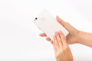 Female hands on a white background with a phone.