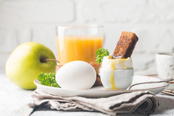 boiled eggs and crispy toasts